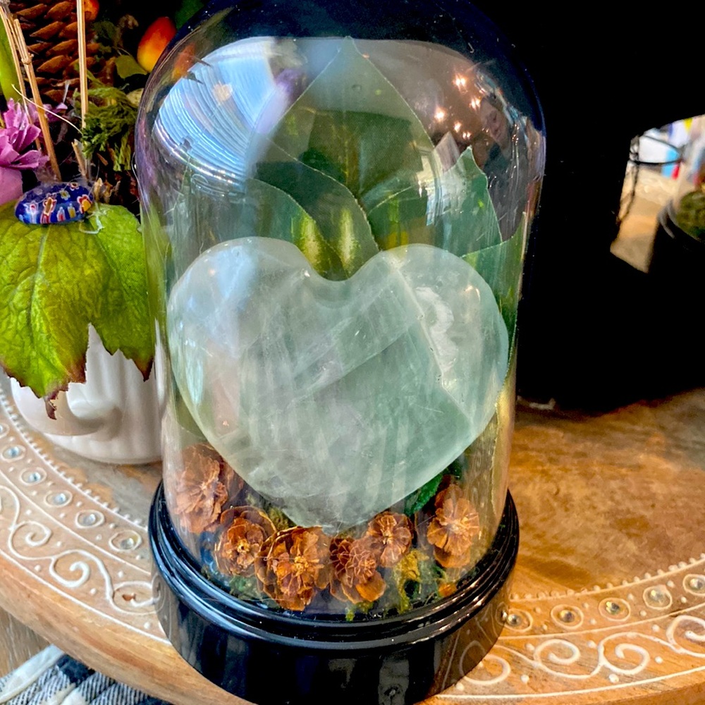 Handmade green relaxing flourite heart crystal in dome display